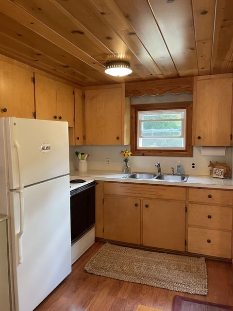 Quaint kitchen but offers everything you need. 