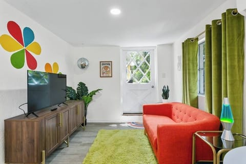 Kick back in this retro-chic 70s living space, full of character and perfect for lounging in style