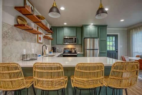 Kitchen with bar stools — great for casual meals and chats.