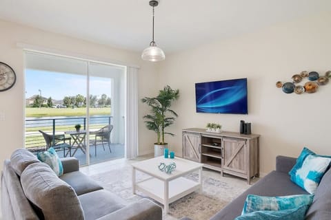 Living Room with Lake view!#Disney #Parks #kingdom #springs #StoreyLake #Apartment #Vacation #Rental #waterpark #Kissimmee #Orlando #universal #citywalk