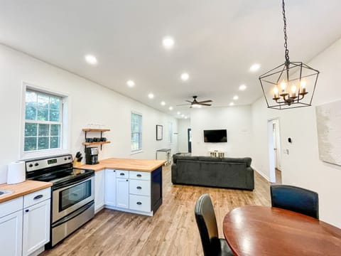 Open floor plan looking over the dining, kitchen, and living room.