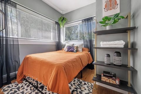 Adventure starts at bedtime. Cozy jungle-inspired queen bedroom designed for comfort and style