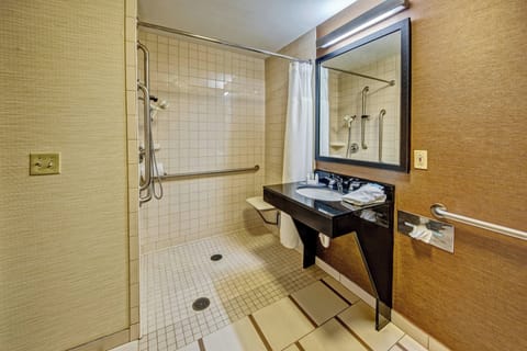 Room, 1 King Bed (Mobility/Hearing Access, Roll-In Shwr) | Bathroom | Combined shower/tub, hair dryer, towels, soap