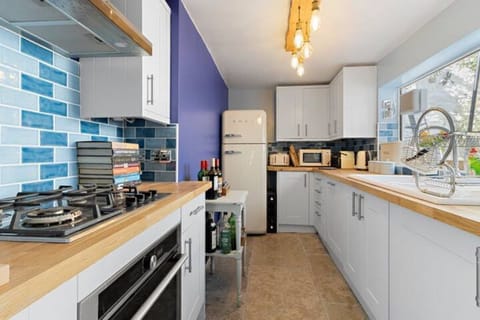 Modern galley kitchen equipped with all you need for a convenient stay