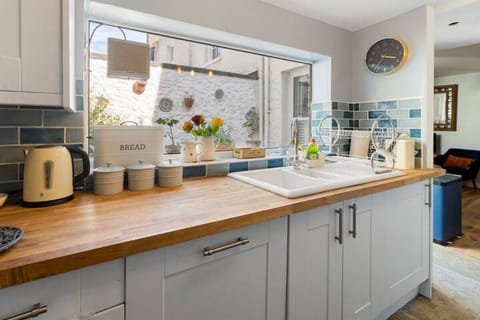 Modern galley kitchen equipped with all you need for a convenient stay