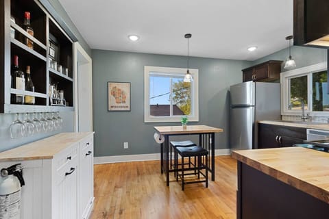 Spacious living area is great for groups, with the main level featuring an open concept living room, kitchen and formal dining room