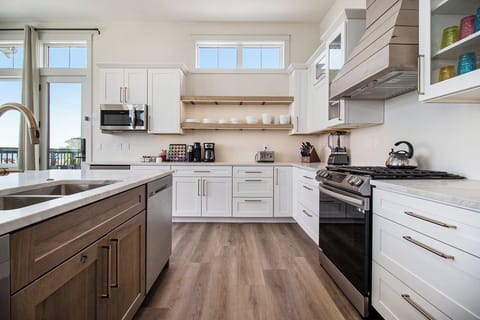 Kitchen with two dishwashers and mini refrigerator 