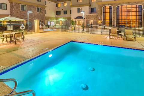Enjoy lounging around the on-site outdoor pool.