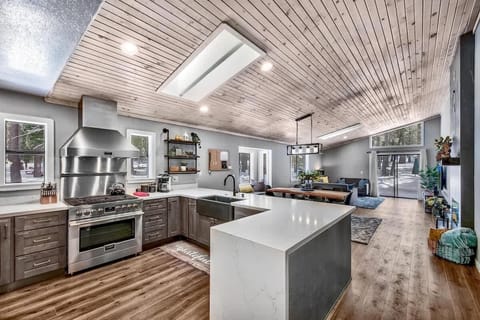 Fully remodeled single story home, with private hot tub, bunk room, brand new and high-end kitchen, fireplace, spa like bathroom, new TV's, arcade table, kids amenities, and more.