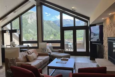 Main living room with breathtaking views of Beaver Creek and the Eagle River. 