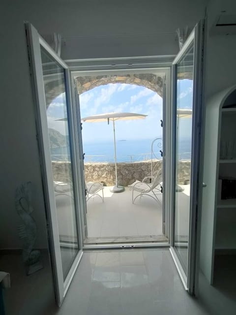 Panoramic Villa | Living area | Flat-screen TV