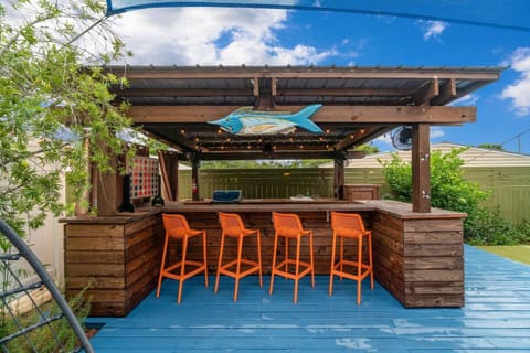 Outdoor bar with grill, lights and nice fans to cool you off on those warm days