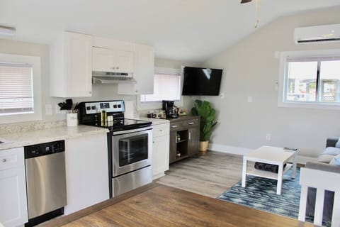 Open layout with well stocked kitchen