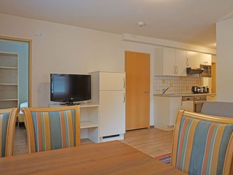 Furniture, Table, Cabinetry, Home Appliance, Wood, Living Room, Interior Design, Building, Flooring, Shelving