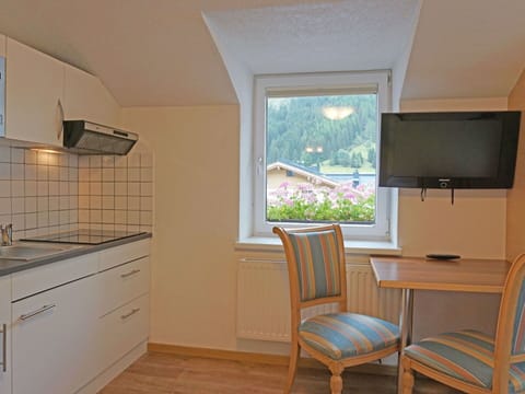 Cabinetry, Furniture, Window, Kitchen, Chair, Building, Wood, Lighting, Architecture, Countertop