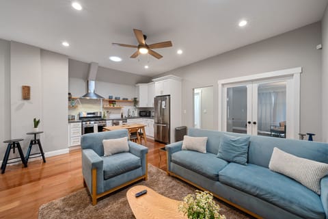 Comfortable and oversized living room sofa and seat with coffee table