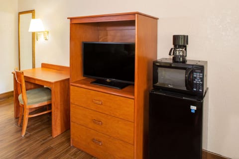 Desk, blackout drapes, iron/ironing board, free cribs/infant beds