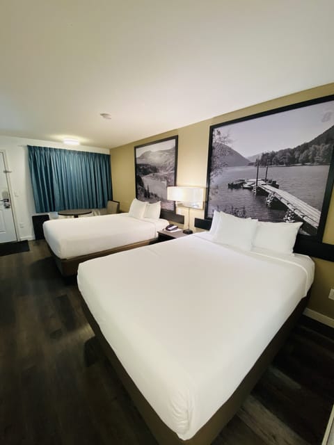 Room, 2 Queen Beds, Kitchen | Desk, laptop workspace, blackout drapes, WiFi (free)