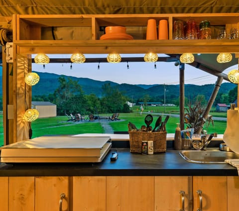 Prepare a delicious dinner on the 4 burner cook stove while taking in the grandeur of the Smokies at sunset.