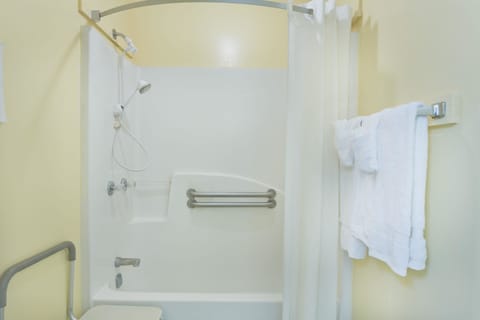 Room, 2 Double Beds, Accessible, Smoking (Mobility) | Bathroom | Combined shower/tub, free toiletries, hair dryer, towels