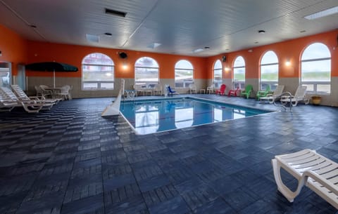 Indoor pool, open 8:00 AM to 11:00 PM, pool umbrellas, sun loungers