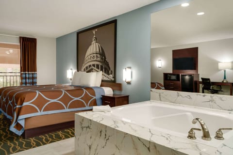 Deluxe Studio Suite, 1 King Bed, Smoking | Desk, iron/ironing board, cribs/infant beds, rollaway beds
