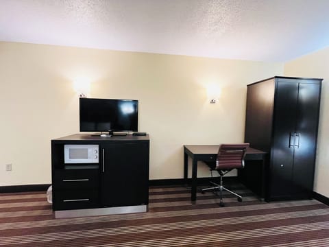 Room, 2 Queen Beds, Non Smoking | Living area | Flat-screen TV