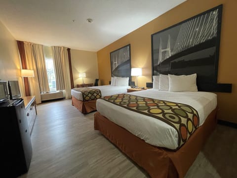 Desk, laptop workspace, blackout drapes, rollaway beds