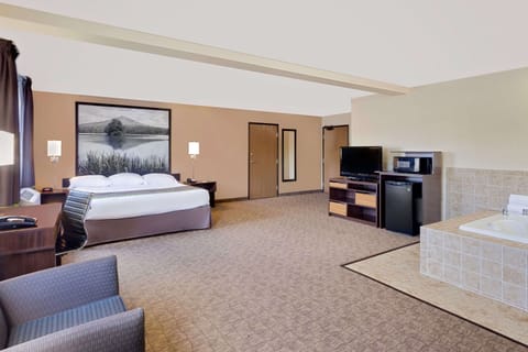 Superior Studio Suite, 1 King Bed, Non Smoking | In-room safe, desk, blackout drapes, iron/ironing board
