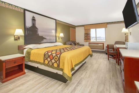 Desk, laptop workspace, blackout drapes, iron/ironing board