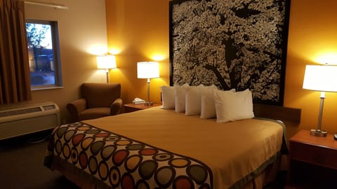 Desk, blackout drapes, iron/ironing board, rollaway beds