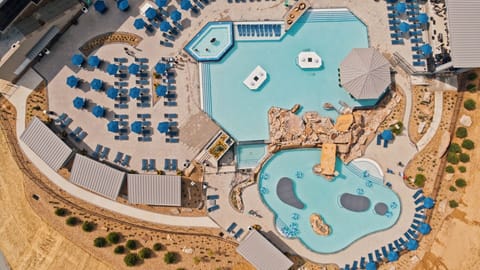 Indoor pool, outdoor pool, open 6:30 AM to 8:00 PM, cabanas (surcharge)