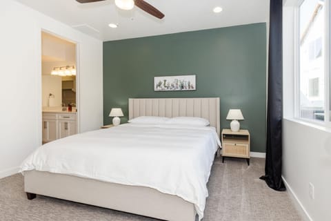 Cozy main-level master with hybrid mattress, bamboo sheets, and TV with Netflix.