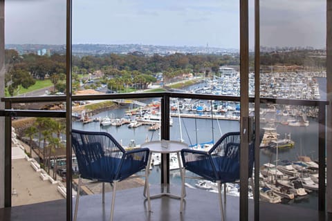 Down comforters, pillowtop beds, in-room safe, desk