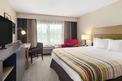 Premium Suite, 1 King Bed, Non Smoking | Premium bedding, down comforters, pillowtop beds, desk