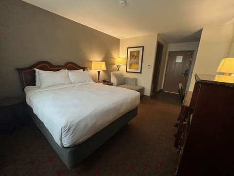 Desk, laptop workspace, blackout drapes, iron/ironing board