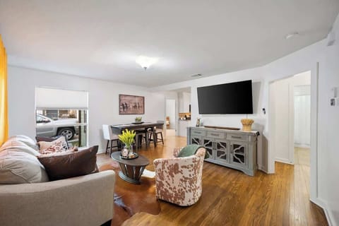 Relaxing Designer Living Area with huge 65" LCD Smart TV