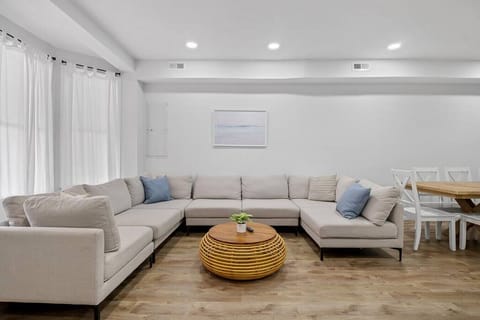 Sink into the inviting embrace of the massive sectional couch, the ultimate gathering spot for TV binging and shared laughter.