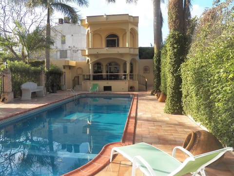 Seasonal outdoor pool, open 9:00 AM to 9:00 PM, sun loungers