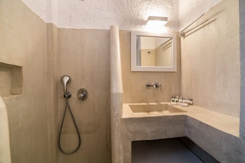 Shower, free toiletries, hair dryer, slippers