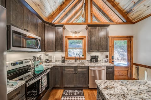 Modern kitchen with the best appliances and cookware