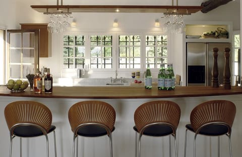 Bar in the dining room looking into the main kitchen