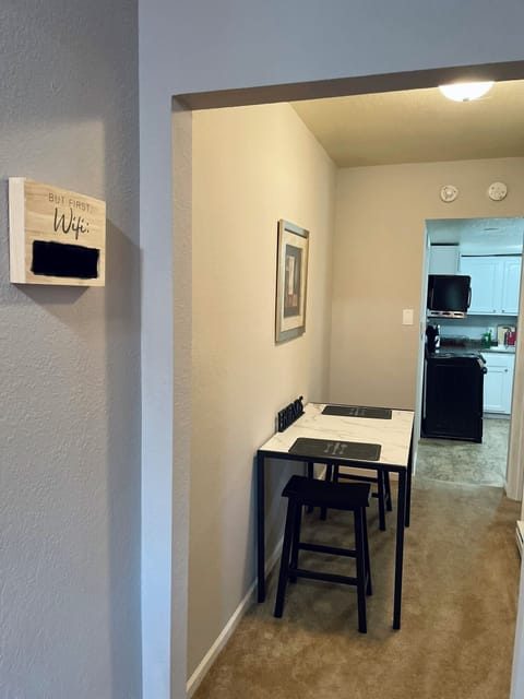 Entry way of dining area/walk way to kitchen, bathroom, and bedroom.