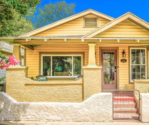 Charming 1928 bungalow at the Boho Bungalow, perfect for couples to enjoy a peaceful retreat while staying just 3 minutes from downtown Pensacola.