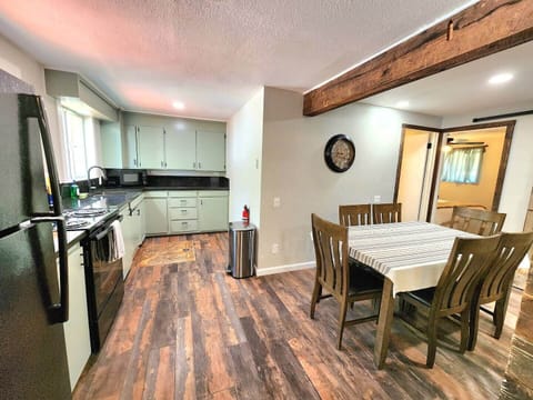 The kitchen is newly renovated with beautiful black granite countertops and a fresh coat of paint! We stock the kitchen with all of the dishes and cooking utensils you may need, as well as extra amenities such as coffee, sugar, coffee creamer, and paper towels.