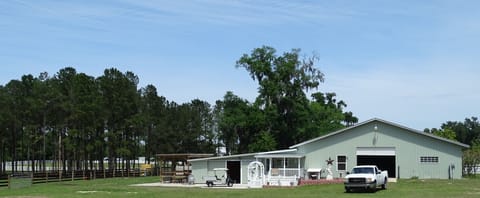 view from main house to barn apartment and stalls