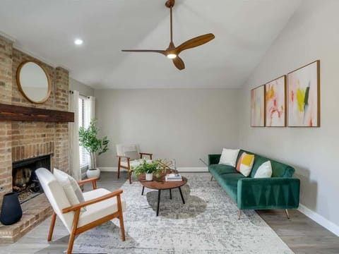 Featuring sleek modern furniture and tasteful designer accents, this is a living room where you can sit back, relax, and put your feet up!