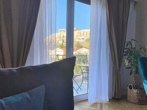 Luxury Apartment | Living area | 55-inch Smart TV with cable channels, TV
