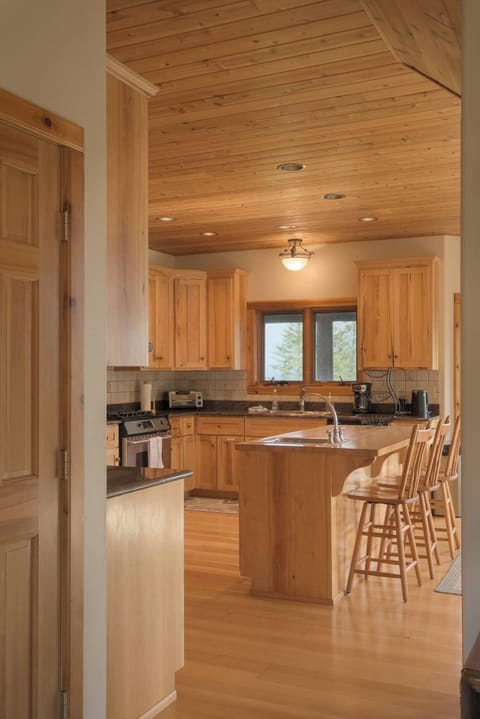 We love this view of the kitchen from the entryway--so inviting!