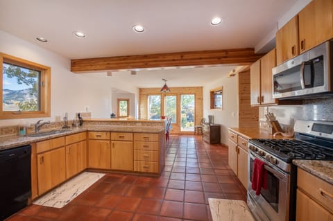 Kitchen opens up to dining room